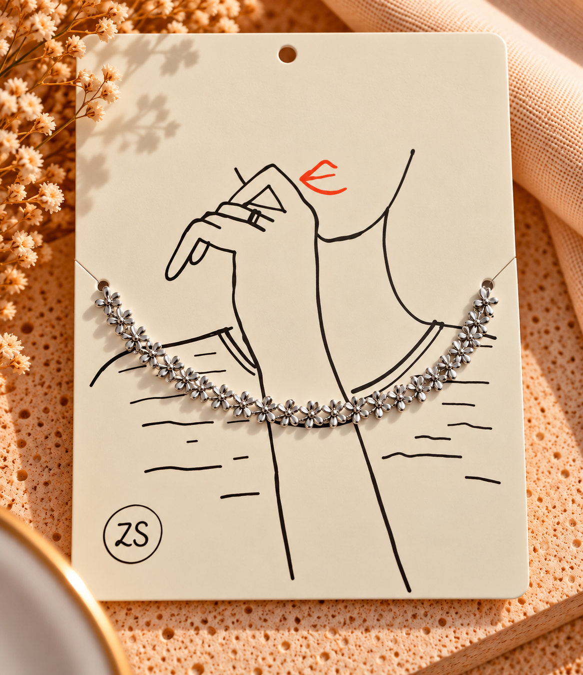 platte armband met strikjes goud