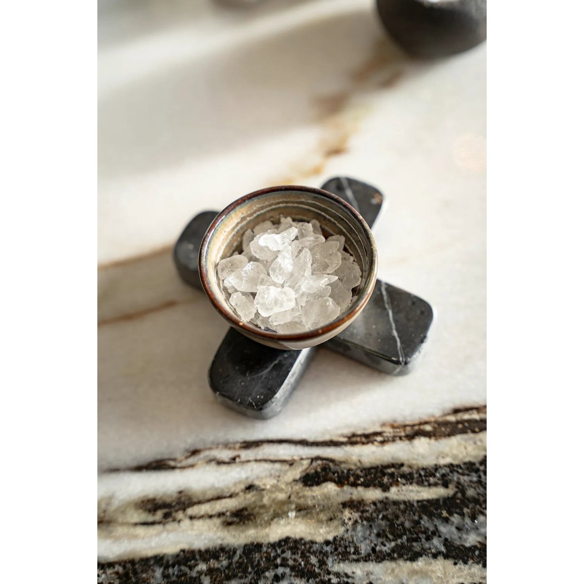 De marmeren pannenonderzetter