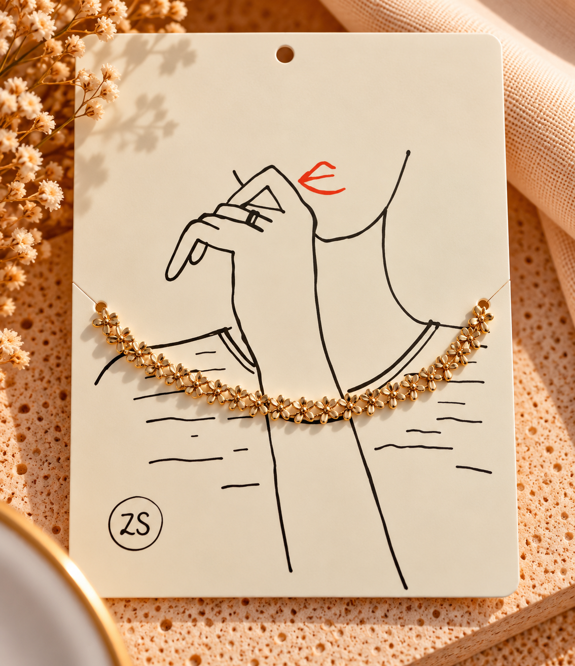 platte armband met strikjes goud